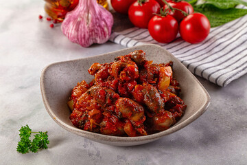 Roasted chicken hearts with vegetables
