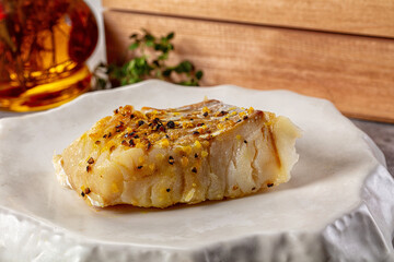 Steamed cod fish fillet with spices