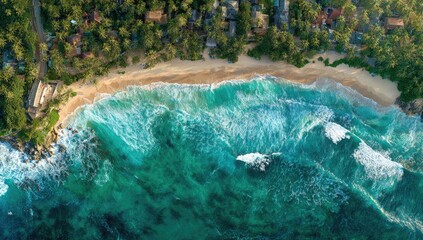 High-angle view of tropical beach, waves, and coastal village