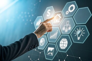 Hand interacting with a futuristic digital interface displaying business icons