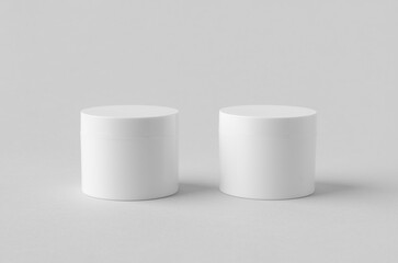White plastic cosmetic cream jar mockup on neutral background