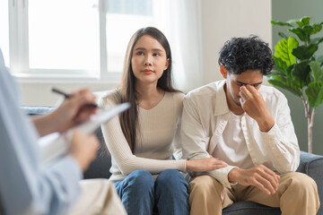 Spouses relationship consultant concept, Married couple listen to psychologist  during therapy talk...