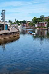 Fototapeta premium Quayside canal basin, with businesses across the water. Central city tourist attraction and historic landmark. Popular visitor location.