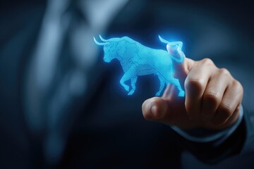 A hand touches a digital bull graphic