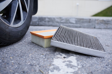 Car air filter on the street. Close-up. Selective focus.