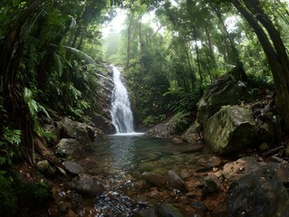 Obraz premium Serene Waterfall Cascades Through Verdant Green Forest