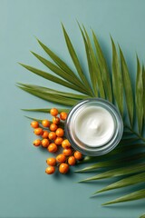 Cream jar, orange berries, palm leaf on teal