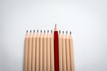 Standing Out from the Crowd – Red Pencil Symbolizing Leadership and Uniqueness