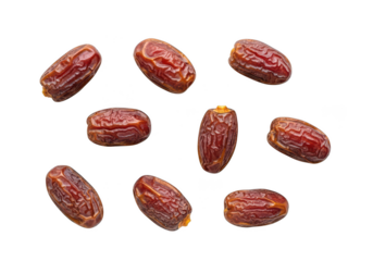 Seven Medjool dates scattered on a studio shot fruit food