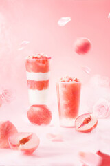 Peach drink in transparent plastic cup with blank label, colorful background