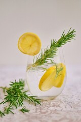 Gin and tonic with rosemary and lemon