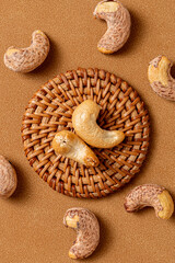 Detail photography of cashew nuts, peeled cashew nuts placed on a bamboo tray