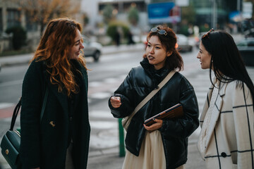 Three women engage in conversation on a bustling city street. They appear to be discussing...