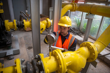 An engineer is controlling the pressure in a gas pipeline in an industrial plant