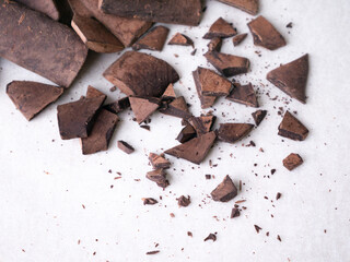 Chunk of cacoa mass bar or cocoa liquor. 100% pure cocoa chocolate.