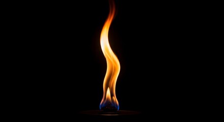 Bright Orange and Blue Flame Burning Against Black Background
