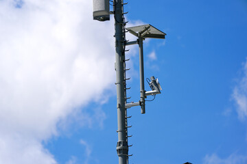 Looking up mobile phone antenna at Lauchernalp at Lötschental Valley in the Swiss Alps on a sunny...