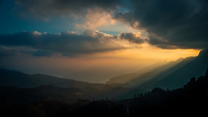 Naklejka premium Majestic mountain range bathed in golden sunset light through dramatic cloudscape scenic views landscape photography
