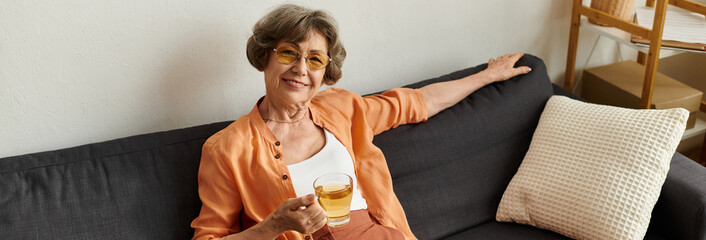 Cozy moments of a senior woman enjoying her time at home in comfortable attire