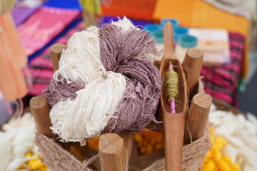 Close-up of Raw Silk Threads , Reeling Silk Thread from Cocoons – Traditional Thai Silk...