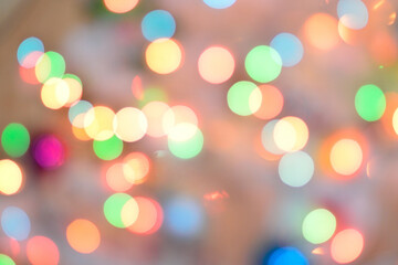 Abstract bokeh lights creating festive and cheerful backdrop, colorful blurred circles ideal for...