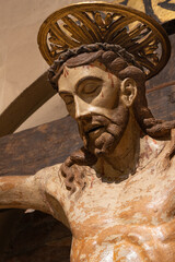 PIACENZA, ITALY - MAY 20, 2025: The detail of terracota Crucifixion in the church Basilica di San...