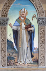 Naklejka premium BOBBIO, ITALY - MAY 20, 2025: The fresco of St. Cumianus in Cathedral (Santa Maria Assunta) by Luigi Morgari from end of 19. cent.