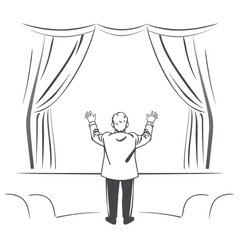 A theatre director calling cues from the wings