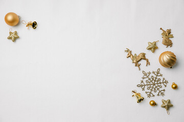 Golden Christmas ornaments and festive decorations on white background, perfect for holiday designs...