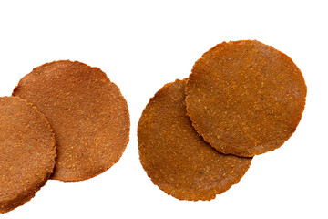 Fermented soybean discs, known as “Thua Nao,” a traditional Thai seasoning used to enhance flavor in Northern cuisine.