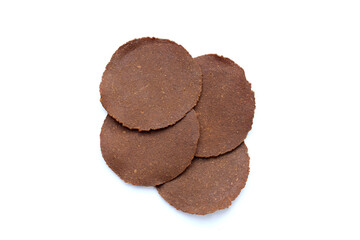 Fermented soybean discs, known as “Thua Nao,” a traditional Thai seasoning used to enhance flavor in Northern cuisine.
