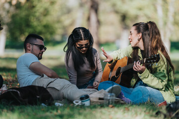 A group of friends relaxing on the grass in a sunny park, enjoying casual conversation and live...