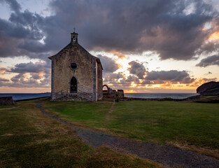 Fototapeta premium The Hermitage of Santa Catalina de Mundaka (Navarra, Spain) at dawn