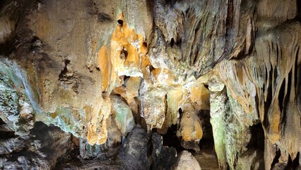 Stunning stalagmites and stalactites inside Thien Cung Cave, a popular attraction in Ha Long Bay, Vietnam.	
