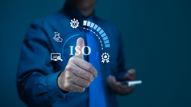 Businessman Giving Thumbs Up for ISO Certification and Quality Standards