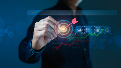 Businessperson Achieving Goals on Digital Interface with Target and Growth Charts