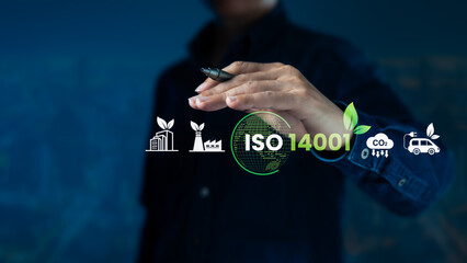 Businessperson Highlighting ISO 14001 Environmental Management System