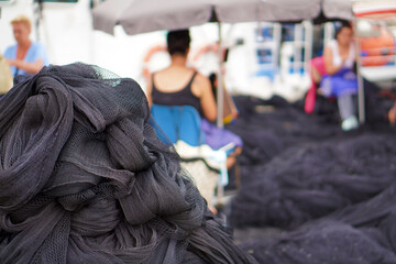 Traditional Fishing Industry &ndash; Women Repairing and Sewing Fishing Nets