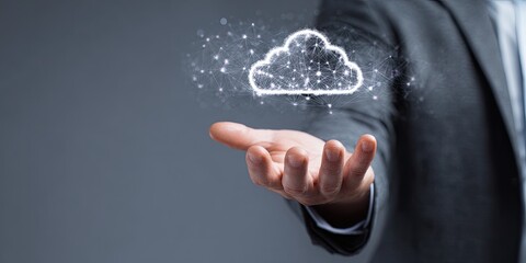 Businessperson holding a digital cloud symbol