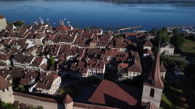 Murten Switzerland establishing shot aerial drone medieval town lake Morat Fribourg region