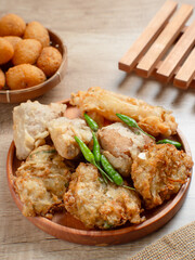 Gorengan is a general term for a large group of Indonesian fried snacks that can be prepared with a variety of ingredients, such as bakwan (fried vegetables), tofu, and risol (fried rice cakes).