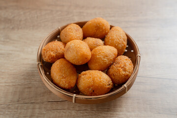 Combro is a typical Sundanese fried food. Combro is made from grated cassava which is shaped round or oval and filled with oncom and chili sauce and then fried.