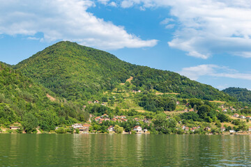 Summer day on the banks of the Drina River dividing Serbia and Bosnia