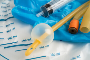 Foley catheter and urine drainage bag collect urine for disability or patient in hospital.