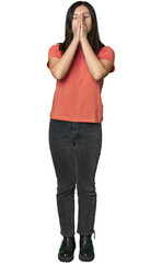 Full-body young Chinese woman holding hands in pray near mouth, feels confident.