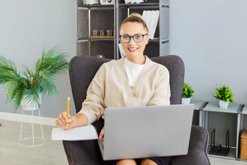 Happy smiling business private secretary working in office, dealing with mail and phone calls,...