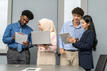 Diverse young professionals meeting on laptop, inclusive teamwork business training, leadership...