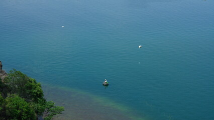 The beautiful countryside view with the clear river and mountains as background in the countryside of the China