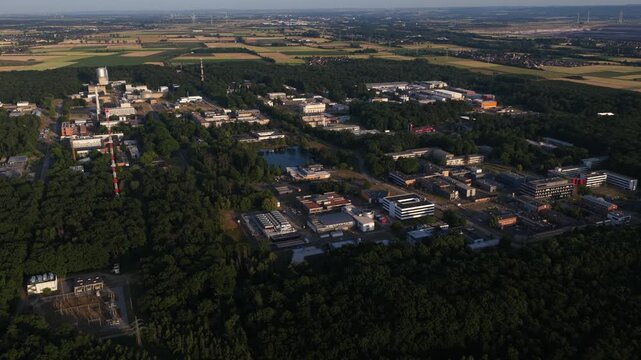 Aerial view of Forschungszentrum Julich interdisciplinary research center surrounded by greenery