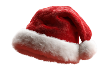 A festive santa hat with a fluffy white trim, isolated on transparent background, evokes the spirit of christmas and holiday cheer